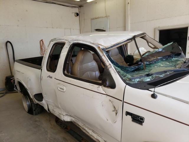 Photo 9 from auction – 2000 FORD F150 with VIN 1FTRX08L6YKA86013