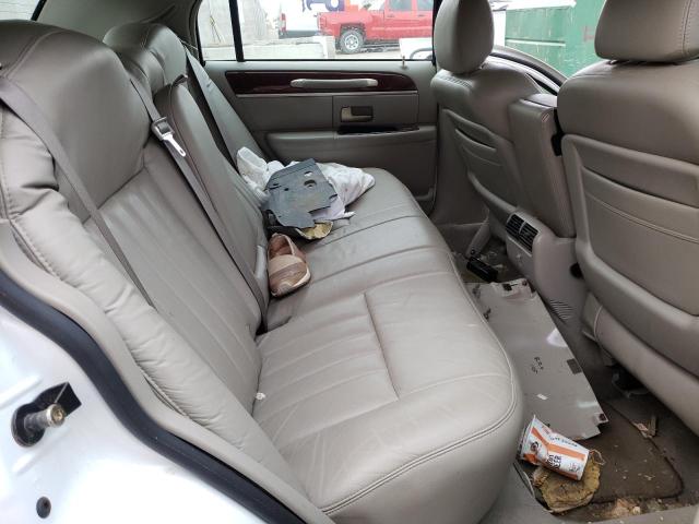 Photo 6 from auction – 2004 LINCOLN TOWN CAR E with VIN 1LNHM81W94Y647752