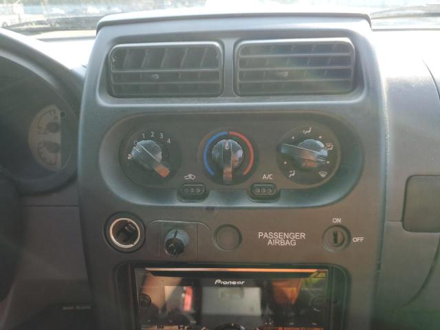 Photo 9 from auction – 2004 NISSAN FRONTIER with VIN 1N6ED26Y94C454803
