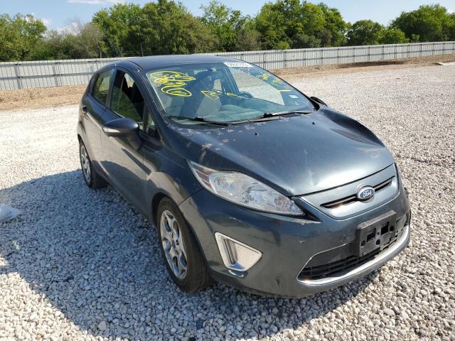 FORD FIESTA SES 2011 with VIN 3FADP4FJ0BM205134 - Photo from auction