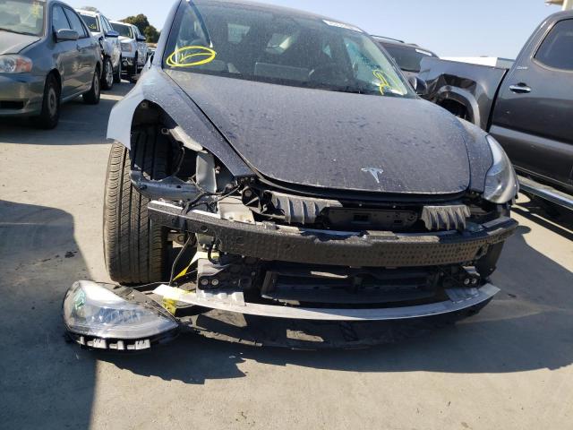 Photo 9 from auction – 2022 TESLA MODEL 3 with VIN 5YJ3E1EBXNF145375