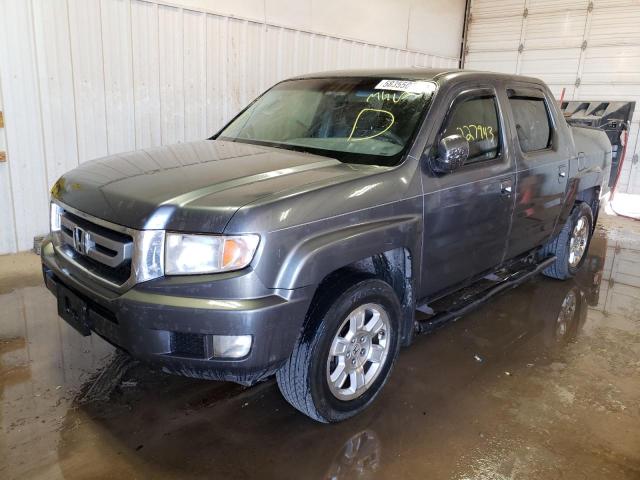 Photo 2 from auction – 2011 HONDA RIDGELINE with VIN 5FPYK1F43BB002205