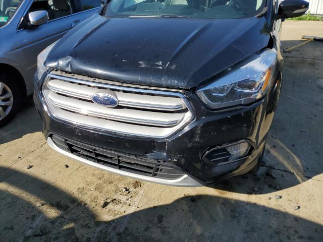 Photo 9 from auction – 2018 FORD ESCAPE TIT with VIN 1FMCU9J94JUA06196