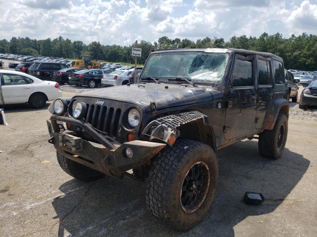 Photo 2 from auction – 2013 JEEP WRANGLER U with VIN 1C4BJWDGXDL682003