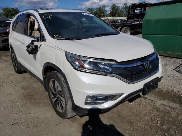 Photo 1 from auction – 2015 HONDA CR-V TOURI with VIN 5J6RM3H97FL010042