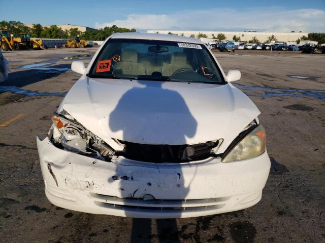 Photo 9 from auction – 2002 TOYOTA CAMRY LE with VIN 4T1BE30K12U035375