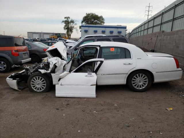 Photo 9 from auction – 2004 LINCOLN TOWN CAR E with VIN 1LNHM81W94Y647752