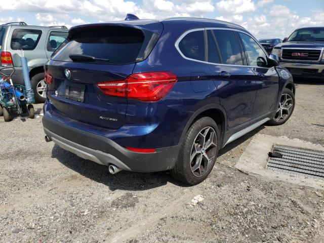 Photo 4 from auction – 2019 BMW X1 XDRIVE2 with VIN WBXHT3C58K5L90518