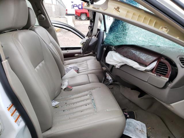Photo 5 from auction – 2004 LINCOLN TOWN CAR E with VIN 1LNHM81W94Y647752
