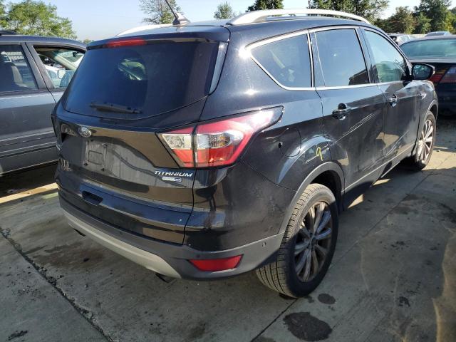 Photo 4 from auction – 2018 FORD ESCAPE TIT with VIN 1FMCU9J94JUA06196
