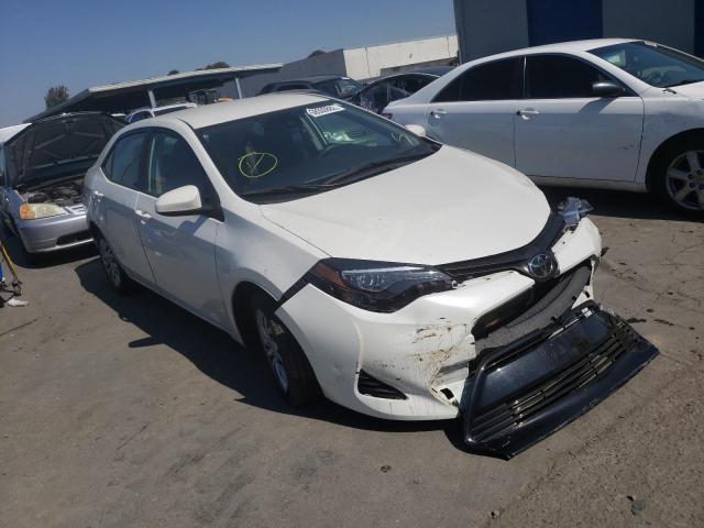 TOYOTA COROLLA L 2019 with VIN 5YFBURHE9KP916069 - Photo from auction