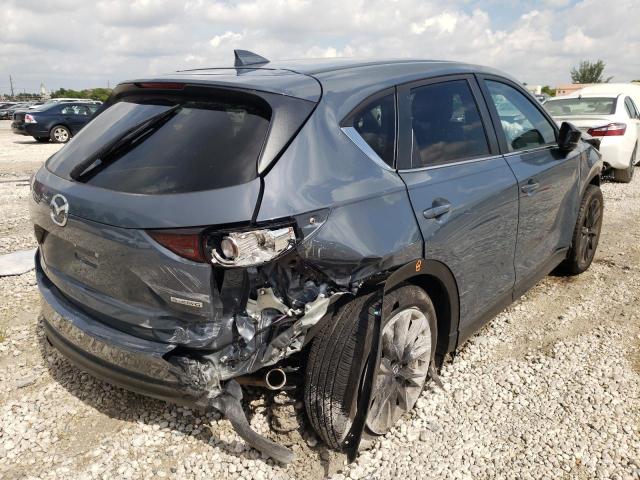 Photo 4 from auction – 2021 MAZDA CX-5 TOURI with VIN JM3KFACM2M0479935