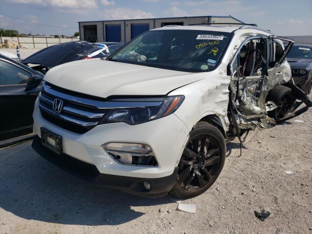 Photo 2 from auction – 2016 HONDA PILOT EXL with VIN 5FNYF6H57GB091400