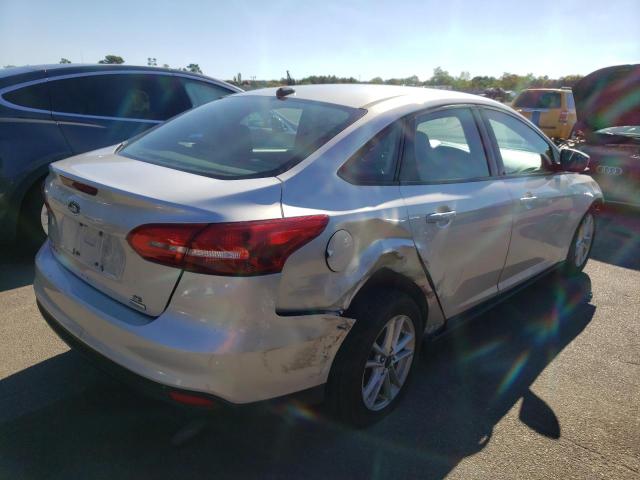 Photo 4 from auction – 2018 FORD FOCUS SE with VIN 1FADP3FE1JL319172