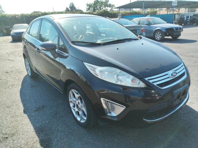 FORD FIESTA SEL 2011 with VIN 3FADP4CJ2BM145703 - Photo from auction
