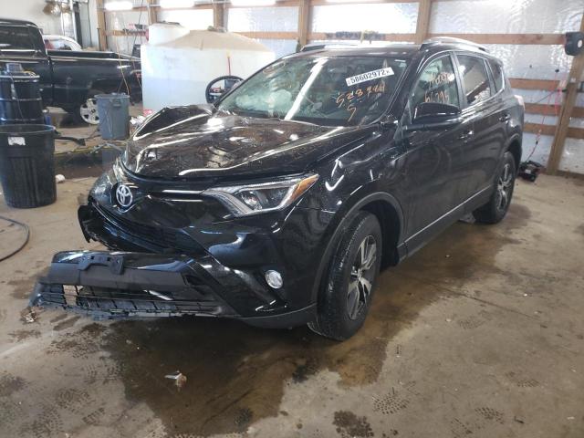 Photo 2 from auction – 2016 TOYOTA RAV4 XLE with VIN 2T3RFREV4GW528984