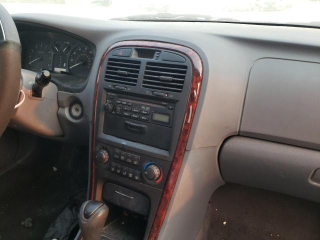 Photo 9 from auction – 2004 KIA OPTIMA LX with VIN KNAGD128945344282
