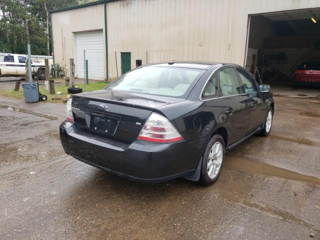 Photo 4 from auction – 2009 FORD TAURUS SE with VIN 1FAHP26WX9G123112
