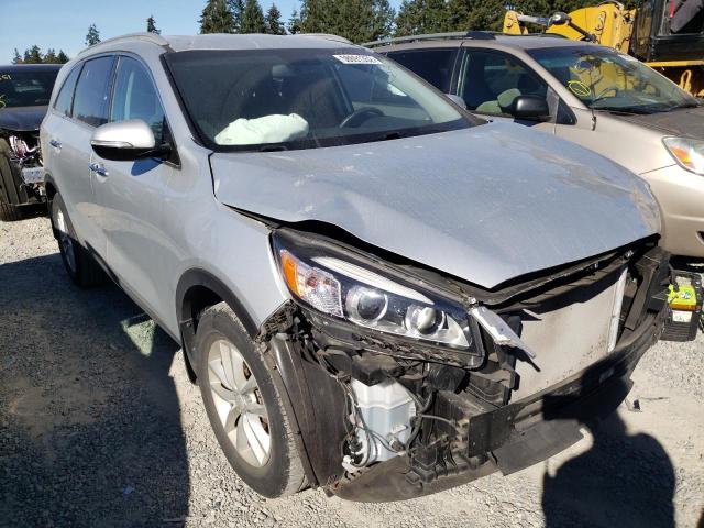 KIA SORENTO LX 2016 with VIN 5XYPG4A30GG003074 - Photo from auction