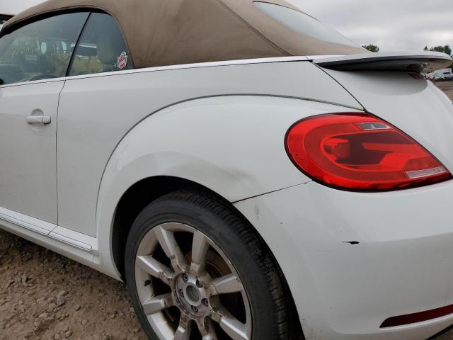Photo 9 from auction – 2014 VOLKSWAGEN BEETLE with VIN 3VW517AT6EM819178