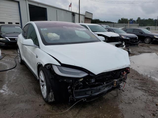 TESLA MODEL X 2018 with VIN 5YJXCDE25JF101139 - Photo from auction