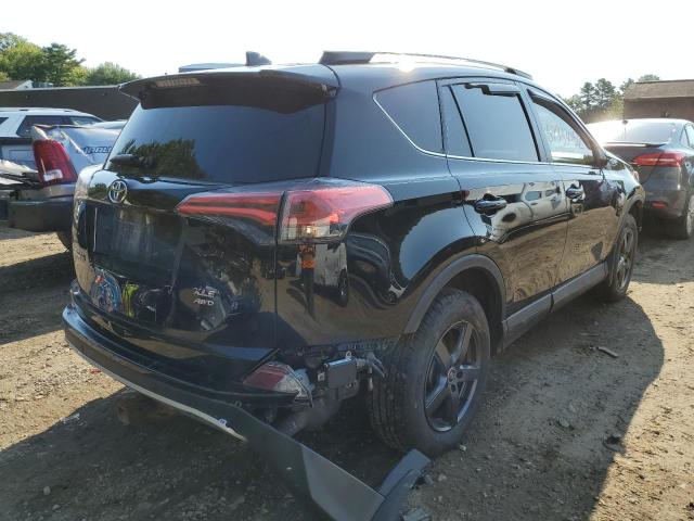 Photo 4 from auction – 2016 TOYOTA RAV4 XLE with VIN 2T3RFREV5GW428389