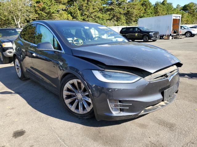 TESLA MODEL X 2016 with VIN 5YJXCBE2XGF011904 - Photo from auction