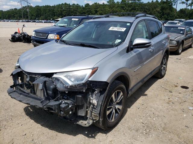 Photo 2 from auction – 2017 TOYOTA RAV4 XLE with VIN 2T3WFREV9HW312861