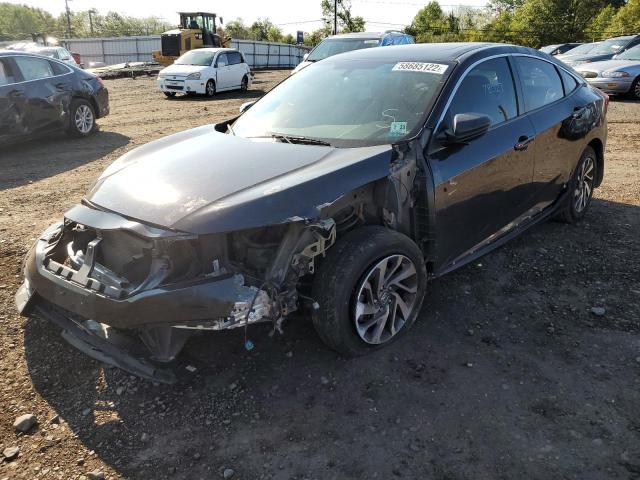 Photo 2 from auction – 2018 HONDA CIVIC EX with VIN 19XFC2F70JE001062