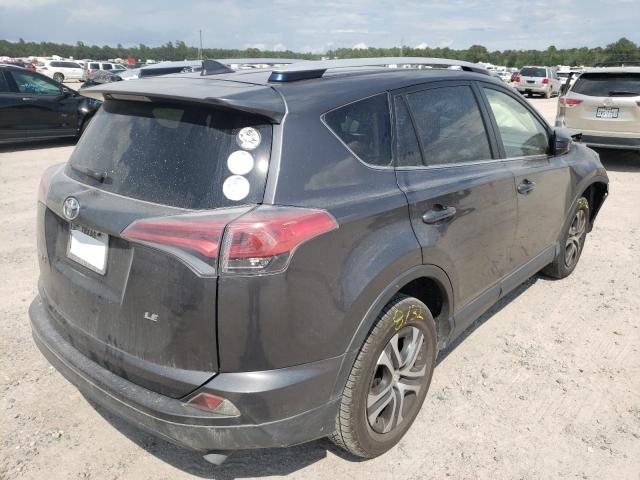 Photo 4 from auction – 2016 TOYOTA RAV4 LE with VIN JTMZFREV8GJ081784
