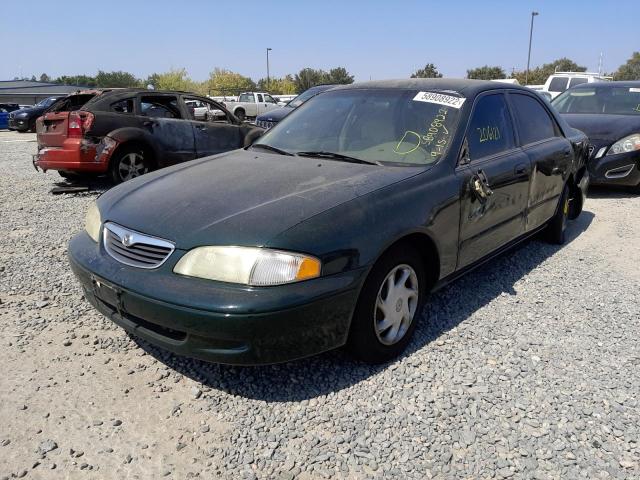 Photo 2 from auction – 1999 MAZDA 626 ES with VIN 1YVGF22C4X5861933