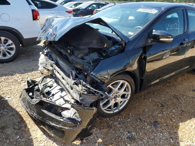 Photo 9 from auction – 2015 FORD FOCUS SE with VIN 1FADP3F25FL256039