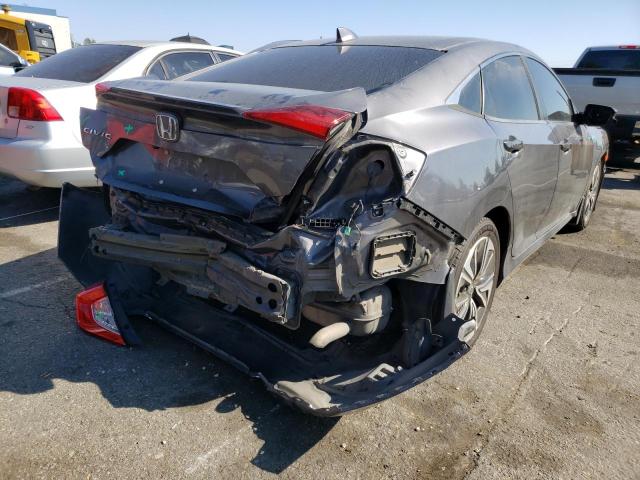 Photo 4 from auction – 2018 HONDA CIVIC EX with VIN JHMFC1F39JX016052