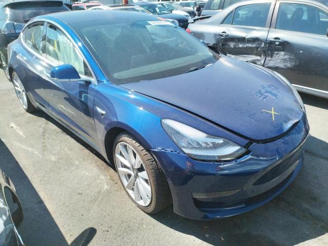 TESLA MODEL 3 2018 with VIN 5YJ3E1EAXJF049909 - Photo from auction