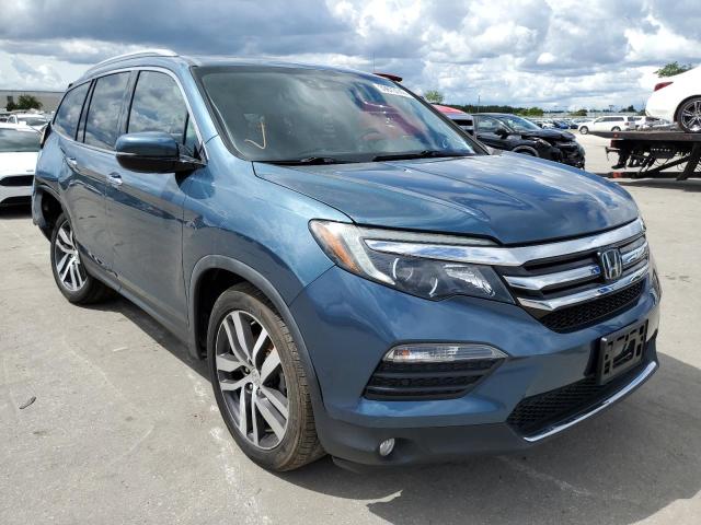 HONDA PILOT ELIT 2018 with VIN 5FNYF6H02JB026837 - Photo from auction