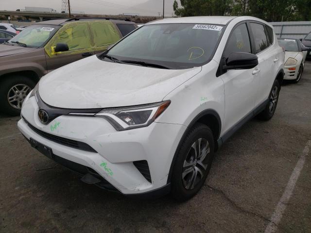 Photo 2 from auction – 2017 TOYOTA RAV4 LE with VIN JTMZFREV8HJ719579