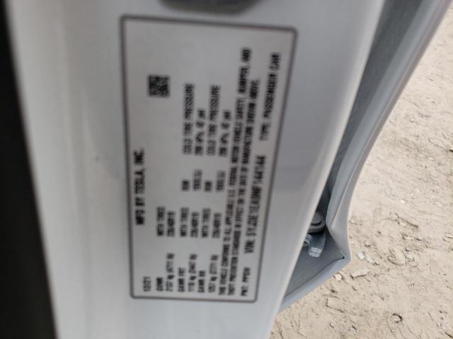 Photo 10 from auction – 2022 TESLA MODEL 3 with VIN 5YJ3E1EA9NF144144