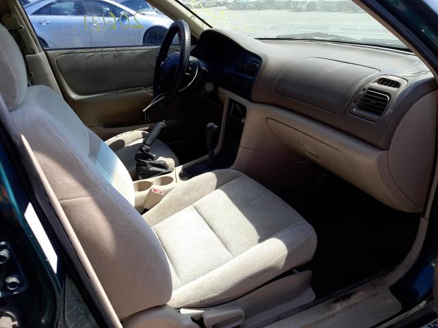Photo 5 from auction – 1999 MAZDA 626 ES with VIN 1YVGF22C4X5861933