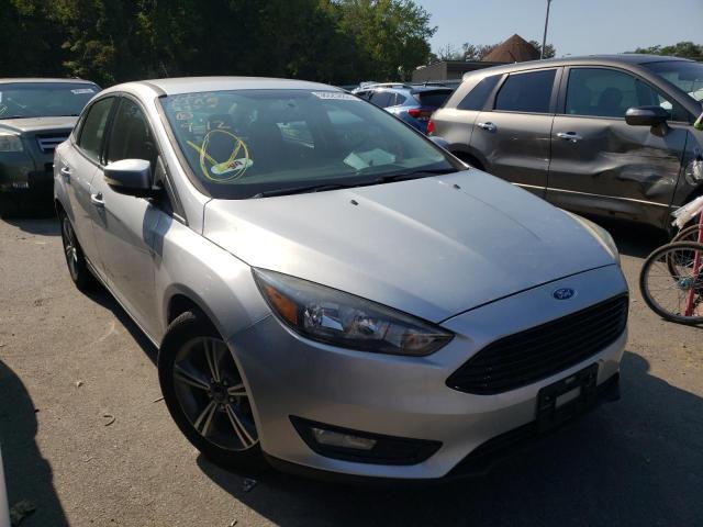 FORD FOCUS SE 2016 with VIN 1FADP3FE1GL381888 - Photo from auction
