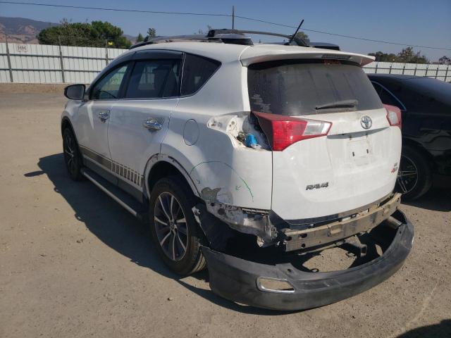 Photo 3 from auction – 2014 TOYOTA RAV4 LE with VIN JTMZFREV7ED035116