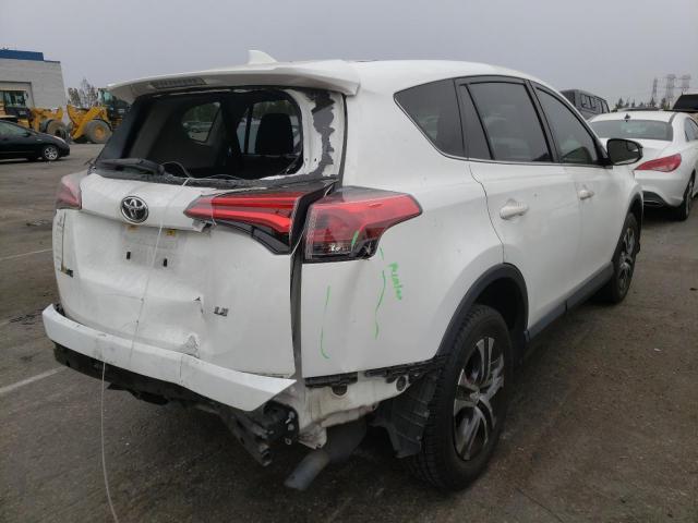 Photo 4 from auction – 2017 TOYOTA RAV4 LE with VIN JTMZFREV8HJ719579