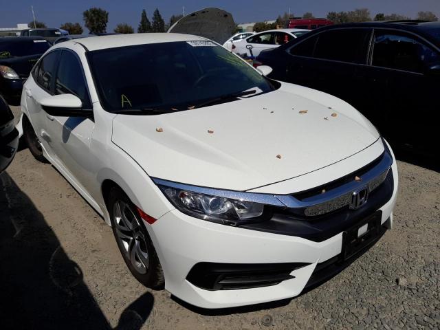 HONDA CIVIC LX 2018 with VIN 19XFC2F56JE200406 - Photo from auction