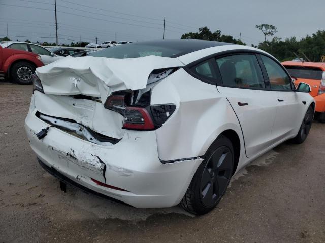 Photo 4 from auction – 2021 TESLA MODEL 3 with VIN 5YJ3E1EA7MF085092