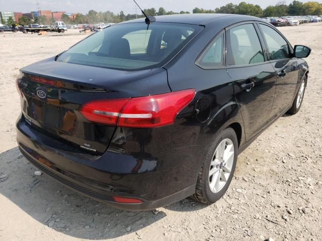 Photo 4 from auction – 2016 FORD FOCUS SE with VIN 1FADP3F28GL390691