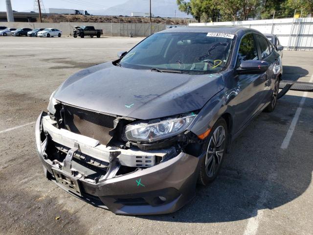Photo 2 from auction – 2018 HONDA CIVIC EX with VIN JHMFC1F39JX016052