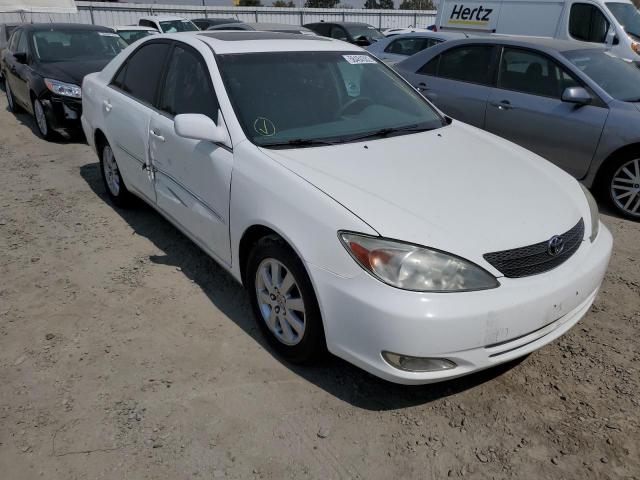TOYOTA CAMRY LE 2003 with VIN JTDBE32K430235676 - Photo from auction