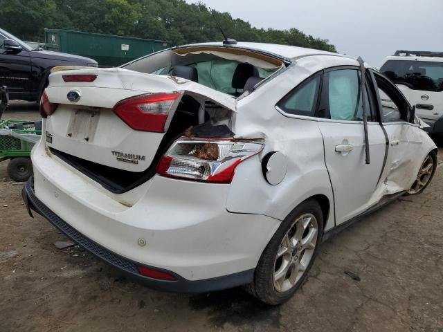 Photo 4 from auction – 2014 FORD FOCUS TITA with VIN 1FADP3J22EL367573