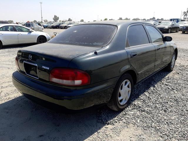 Photo 4 from auction – 1999 MAZDA 626 ES with VIN 1YVGF22C4X5861933