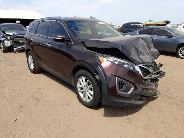 KIA SORENTO LX 2016 with VIN 5XYPG4A58GG081684 - Photo from auction