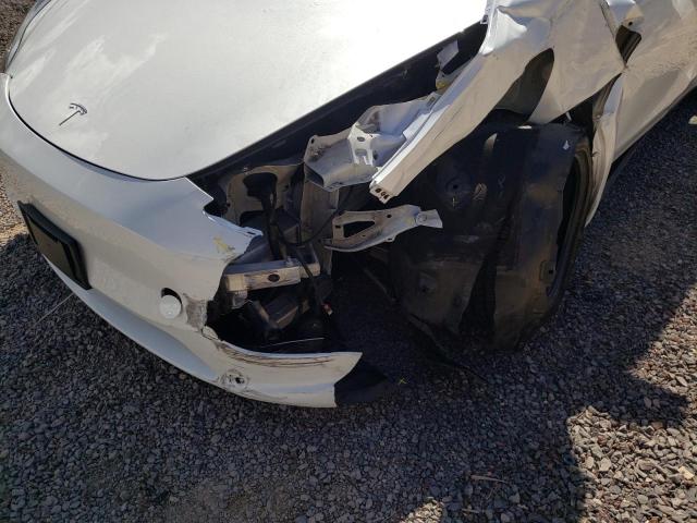 Photo 9 from auction – 2020 TESLA MODEL Y with VIN 5YJYGDEE6LF009088